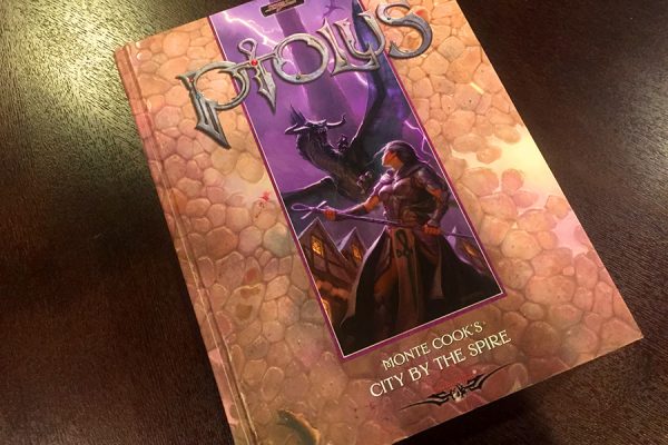 Ptolus book on table